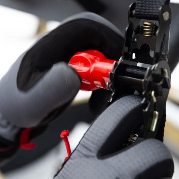 Someone tightening an OmegaStrap strap